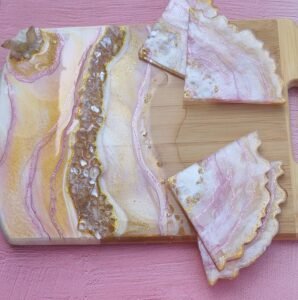 pink cutting board and coasters